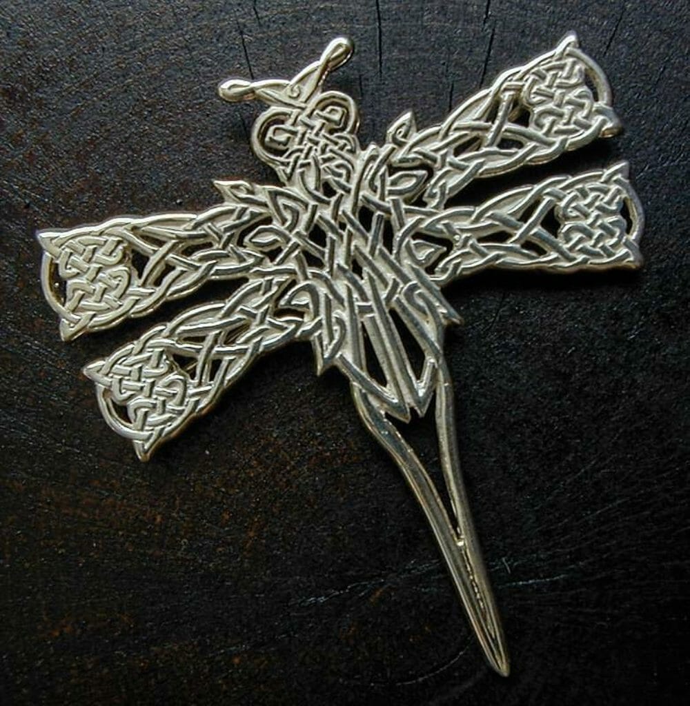 Original Celtic knotwork dragonfly design cast in silver with pin backing.