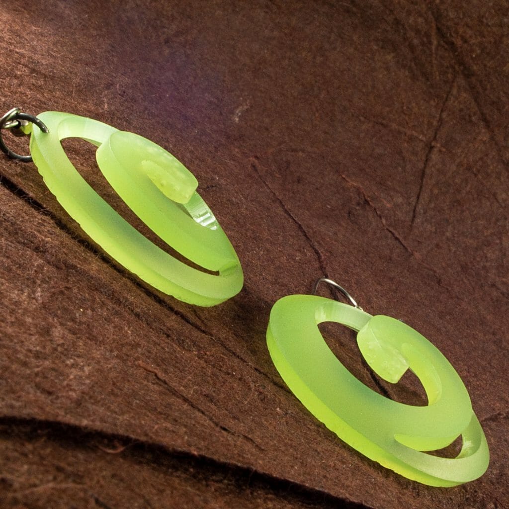 Translucent Kiwi Green Dished Acrylic Spiral Earrings (side view)