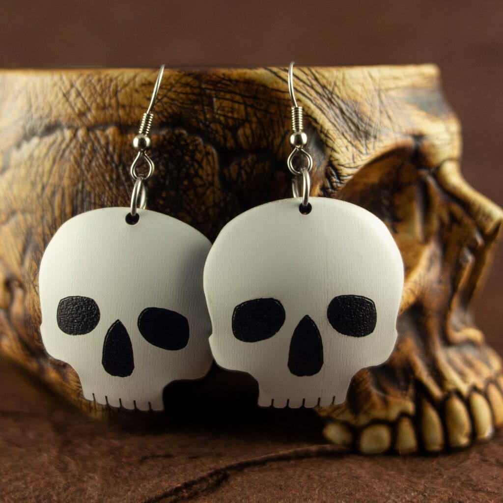 Two-Toned Dished Acrylic Skull Earrings