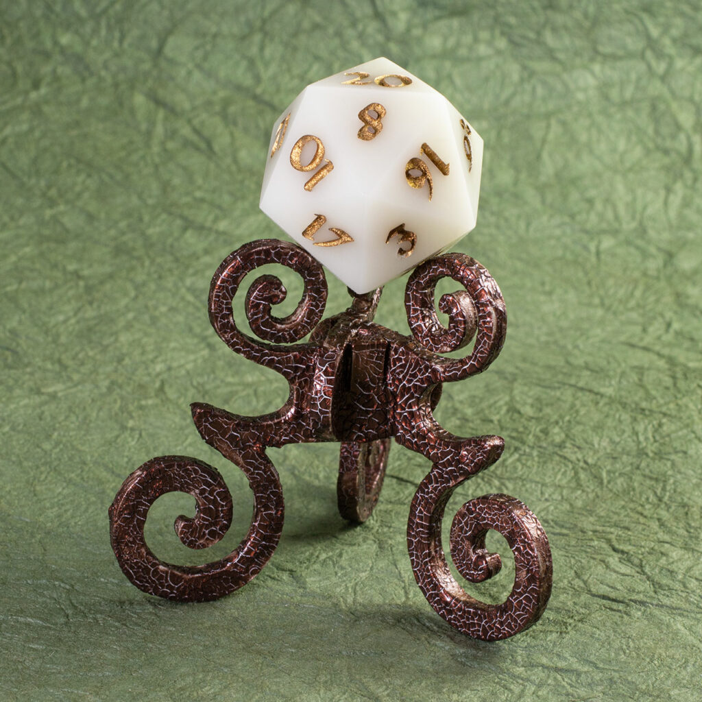 Bronze Crackle Reliquary with pale stunt D20 chonk with gold numbers