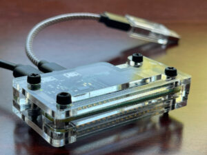 Networked USB drive built with a Raspberry Pi Zero in a laser-cut clear acrylic case.