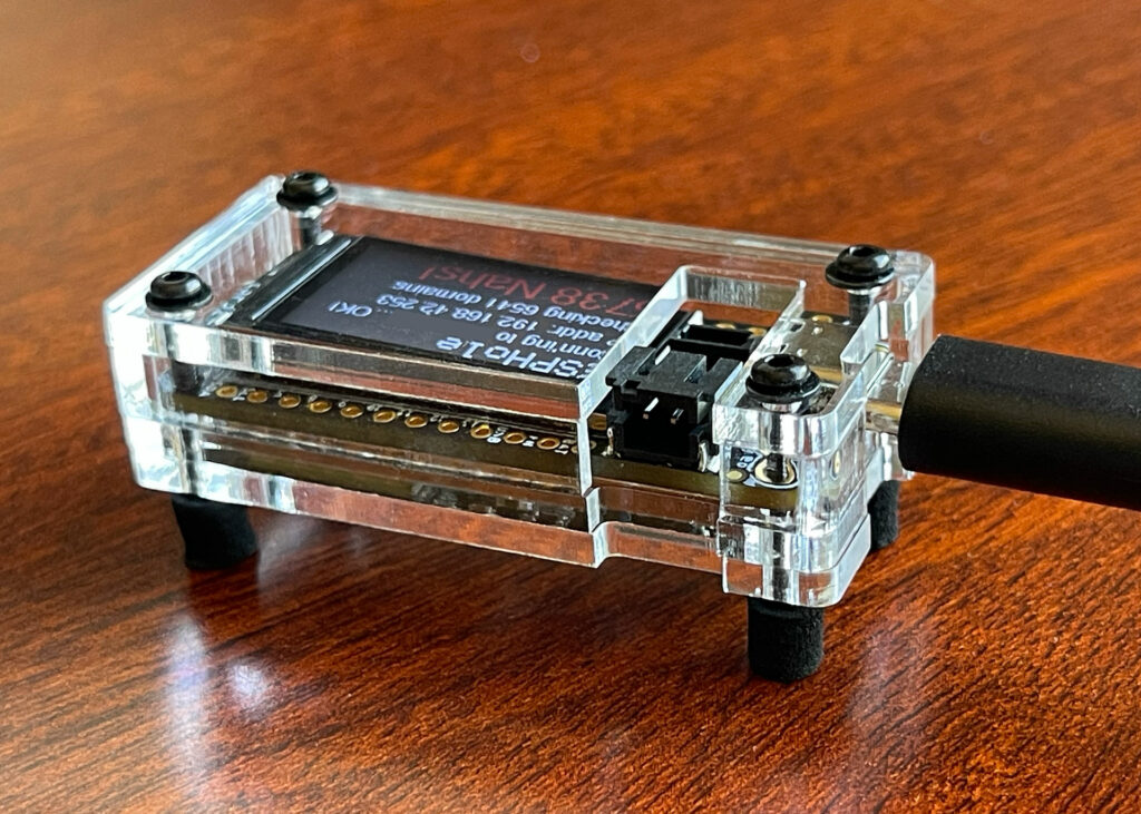 ESP32-S2 TFT Feather running ESPHole in a custom laser-cut acrylic case.