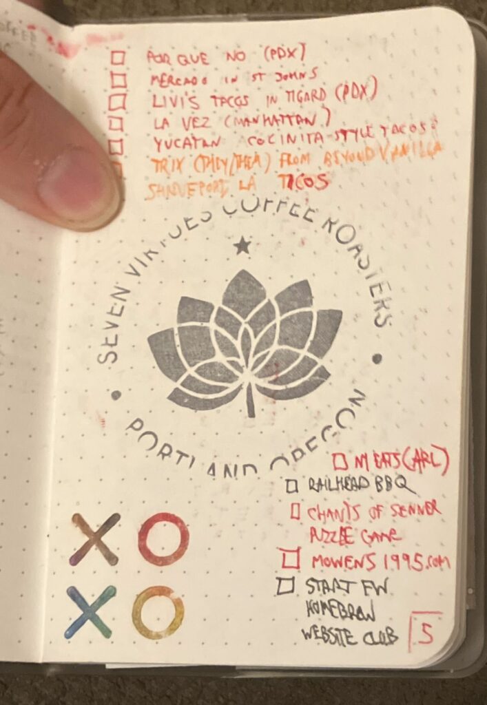 A dot grid Field Notes page with a list of places to get tacos in Portland with a stamp from Seven Virtues Coffee Roasters and the XOXO stamp in rainbow colors.