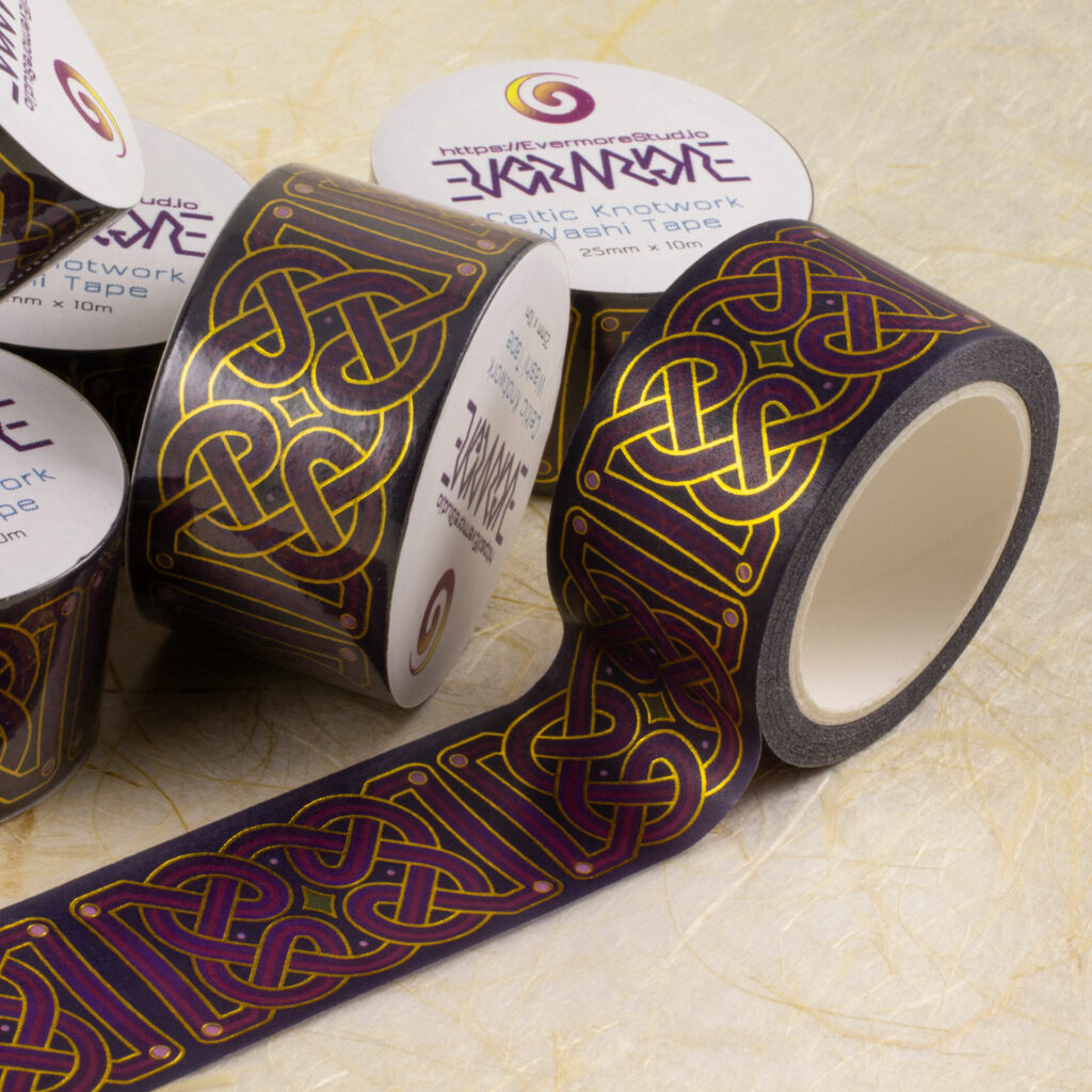 Rolls of 25mm-wide washi tape with Celtic knotwork in shades of purple with gold foil outlines.