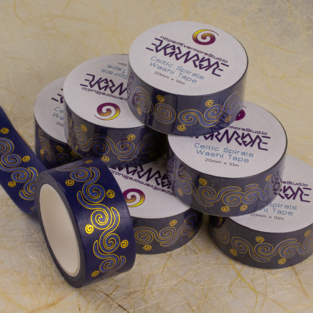 Rolls of 20mm-wide washi tape with a pattern of Celtic spirals in shades of blue with gold foil outlines.