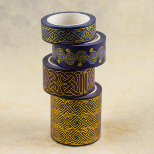 A staggered stack of four Celtic art washi tapes (two key patterns, one knotwork, and one spirals design) without their packaging for better viewing.