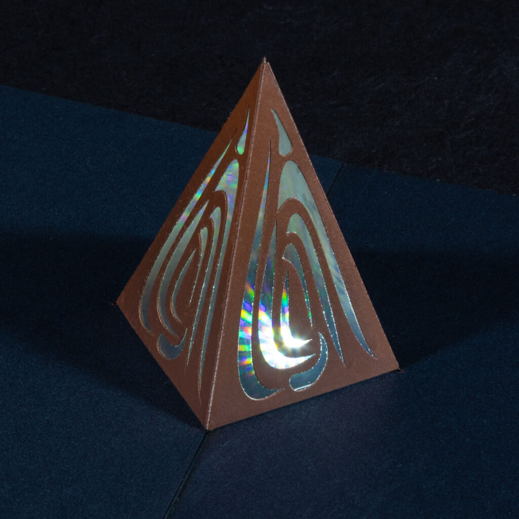 Three-quarter view from a little above, highlighting one face of the pyramid.
