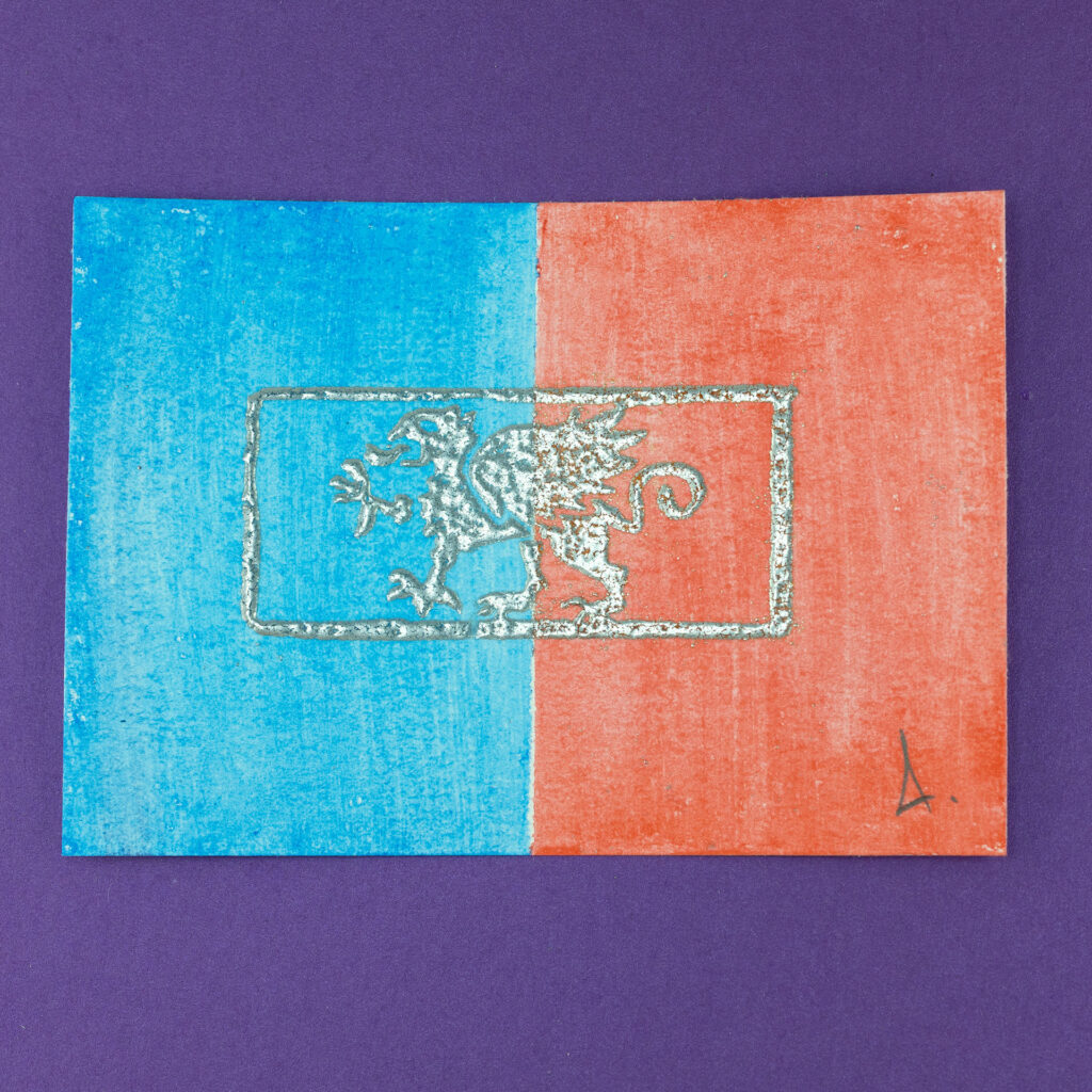 The left half of a landscape-format piece of paper has been colored blue with watercolor paint, and the right half red. Embossed in metallic silver is a left-facing griffin (a beast with the head, wings, and front claws of an eagle, and the body of a lion) passant (standing flat with one claw raised) surrounded by a rectangular border. The print is signed with a stylized A in the lower right corner. The background (behind the print) is purple.